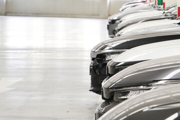 City Cars lot in a row in the parking garage. New Car for sale.