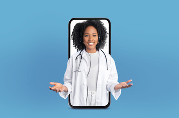 A telemedicine session is featured with a young African American woman medical expert, who stands...