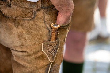 traditioinal leather trousers with pocket knife