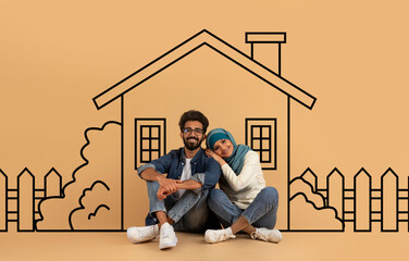 Eastern man and woman are seated on the ground directly in front of a residential building. They both appear relaxed and engaged in conversation, surrounded by a typical suburban setting.