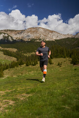 Trail runner man in a race - 808263901