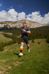 Trail runner man in a race - 808263902