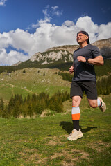 Trail runner man in a race - 808263903