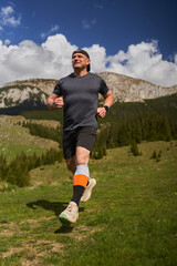 Trail runner man in a race - 808263904