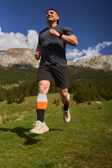 Trail runner man in a race - 808263912
