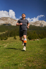 Trail runner man in a race - 808263913