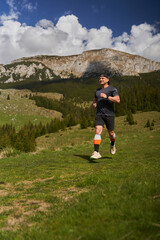 Trail runner man in a race - 808263914