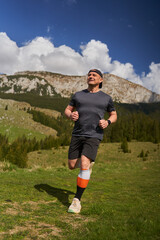 Trail runner man in a race - 808263918