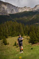 Trail runner man in a race - 808263930