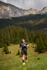 Trail runner man in a race - 808263933
