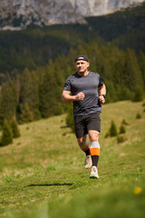Trail runner man in a race - 808263962