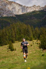 Trail runner man in a race - 808263964