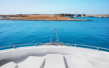 Obraz premium Sun beds on a boat deck, selective focus.