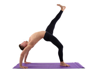 Fitness and meditation. Healthy lifestyle. Young attractive man doing yoga on a white background.