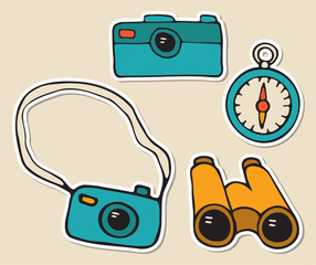 Camp stickers set of photo camera, compass and binocular. Hand drawn vector doodles in flat style.
