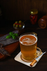 still life with a mug of beer in a rustic style