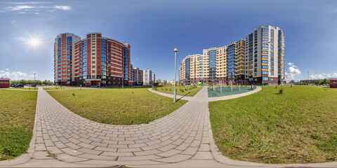 hdri panorama 360 near skyscraper multistory buildings of residential quarter complex in full equirectangular seamless spherical projection