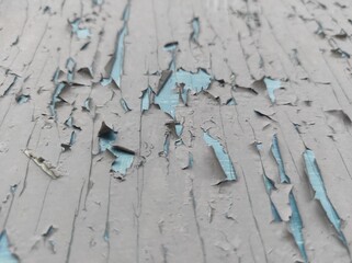 Photo texture old peeling paint. The paint is old. It is crumbling