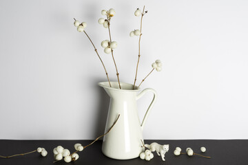 Snowberry in vase beautifully illuminated