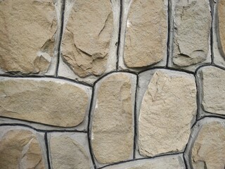 Photo of natural stone texture. Texture of the wall made of natural stone