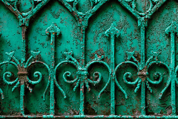 Ancient green rusty forged fence decoration,  vintage decoration
