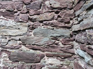 Photo of natural stone texture. Texture of the wall made of natural stone