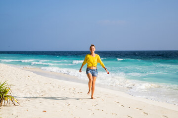 beautiful woman having fun on a tropical beach