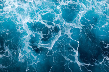 Ocean water background with foam. Ocean water splash. Not a calm