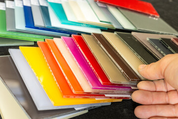 Samples of colored lacquered glass for interior finishing of apartments and offices, decorative...