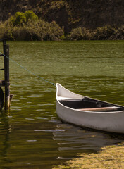 Obraz premium photograph of boat floating on the water of a lake