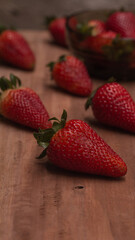 photography of strawberries on wooden background, strawberries texture