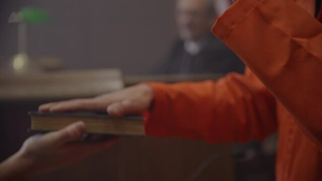 Swearing in on bible in criminal case trial