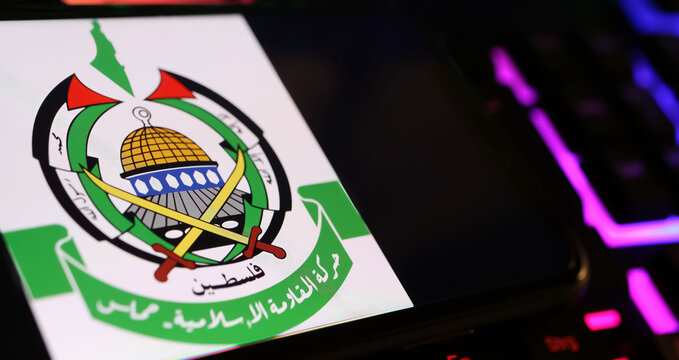 Viersen, Germany - May 1. 2024: Smartphone with Hamas emblem  on computer keyboard