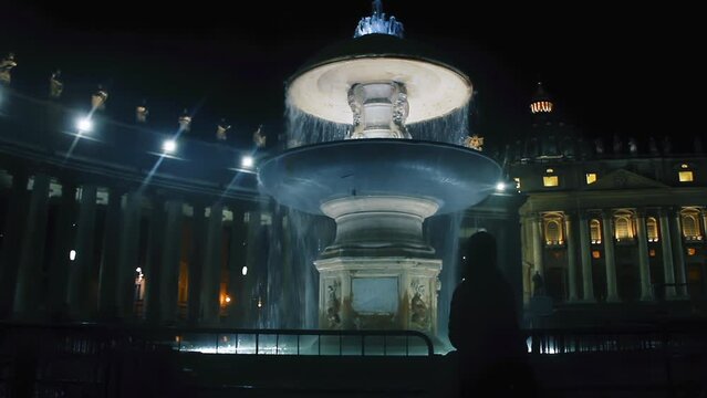 A Fountain in Front of St Peters Basilica and the Sistine Chapel at Night, Rome, Italy. 4K Resolution.