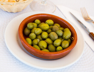 Green olives - tasty snack. High quality photo