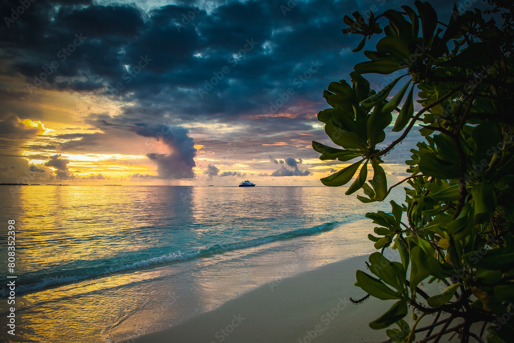 Wall mural amazing sunset over the sea on a tropical island