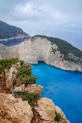 wide angle  upper panorama of the famous shipwreck of Navagio Beach