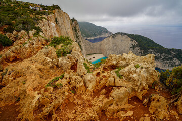 famous panoramic viewpoint of the Navagio Beach shipwreck surroundedby rocky cliffs
