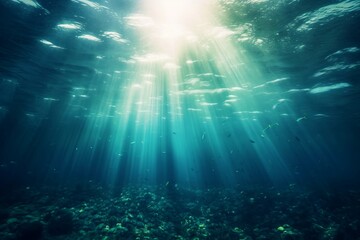 Fototapeta premium Tranquil Underwater Scene with Sunlight Piercing Through, Illuminating the Azure Depths