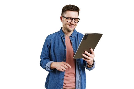 A man consultant with glasses uses a tablet, online work in an application, cut isolated