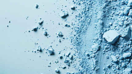 Close-up of scattered blue powder on light background