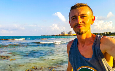 Male tourist Travelling man taking selfie Playa del Carmen Mexico.