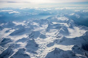 Obraz premium Aerial view of snowy mountain landscape