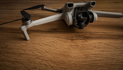 Drone on a wooden table copy space