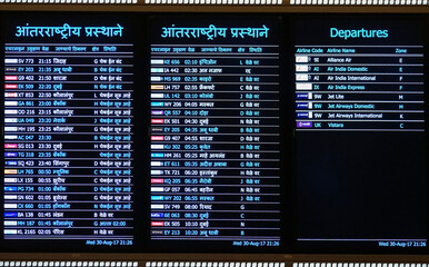 Departure board at Mumbai's airport, India