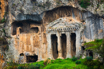 Naklejka premium Lycian Rock tombs in ancient Tlos city at Fethiye, Turkey