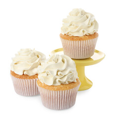 Tasty vanilla cupcakes with cream isolated on white