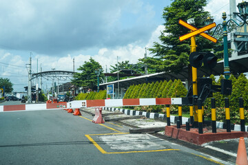 Indonesia, Yogyakarta, April 13, 2024: Railway crossing portal at Tugu station Yogyakarta