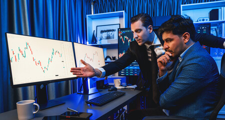 Stock exchange traders looking on high profit chart investment in panorama view, analyzing on...