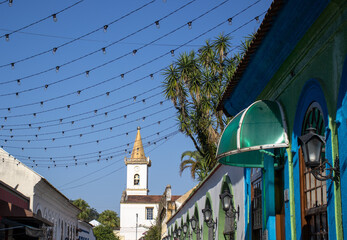 Lamped historic houses and church in the background in the city of Morretes Parana Brazil